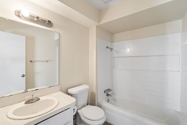 full bathroom with vanity, toilet, and washtub / shower combination