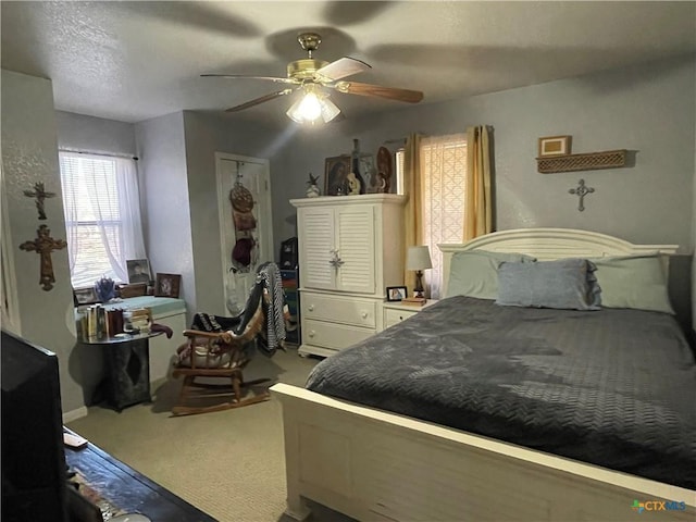 bedroom with carpet flooring and ceiling fan