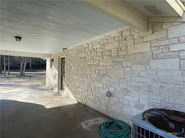 interior details featuring visible vents and central air condition unit