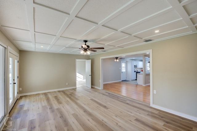 unfurnished room with light wood finished floors, baseboards, ceiling fan, coffered ceiling, and recessed lighting