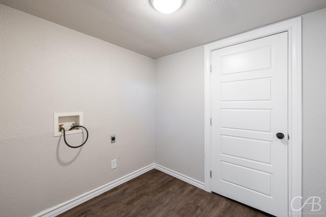 clothes washing area featuring washer hookup, hookup for an electric dryer, dark wood-type flooring, and a textured ceiling