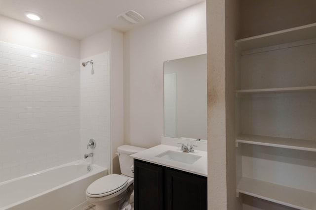 full bathroom featuring vanity, toilet, and tiled shower / bath