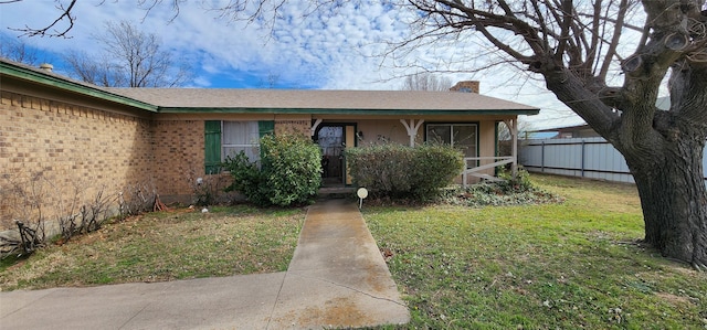 view of front of house with a front lawn