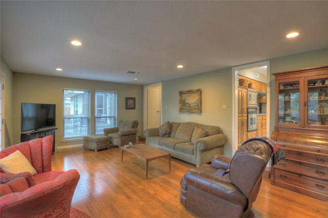 living room featuring light wood-type flooring