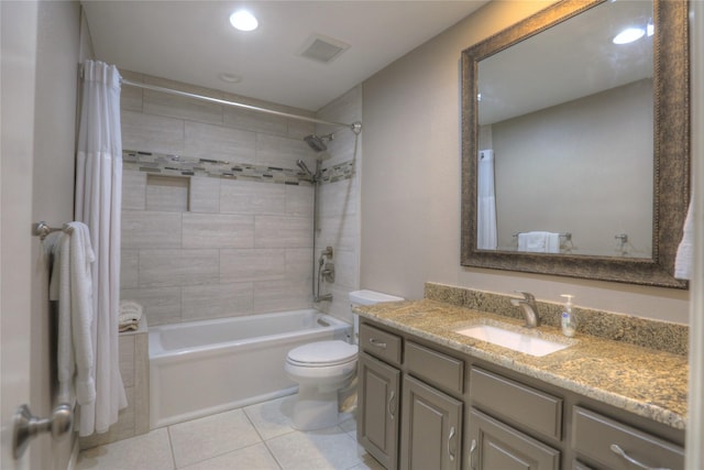 full bathroom with tile patterned flooring, vanity, shower / bath combination with curtain, and toilet