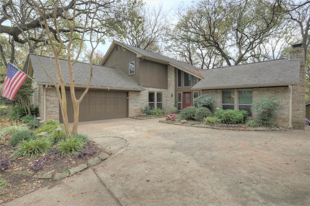 view of front of property with a garage