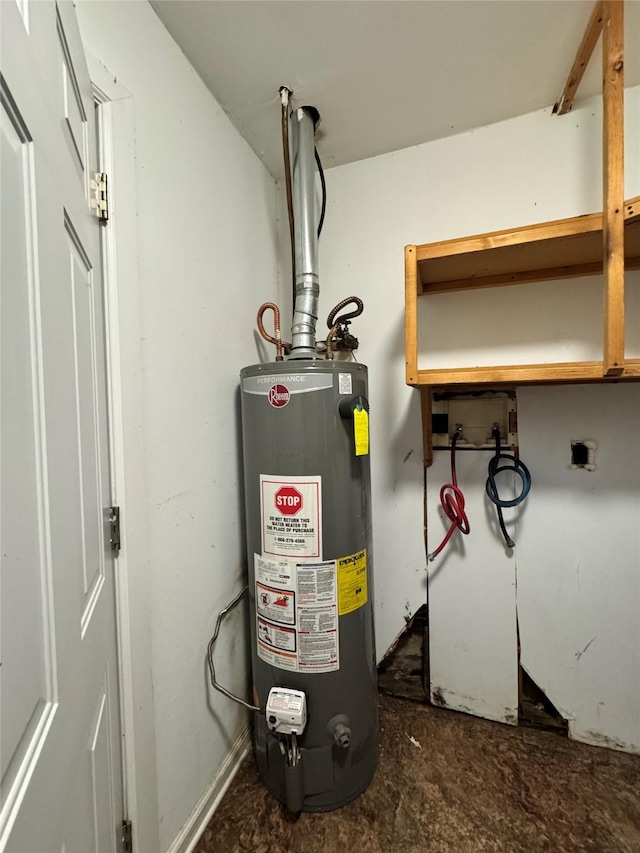 utility room featuring water heater