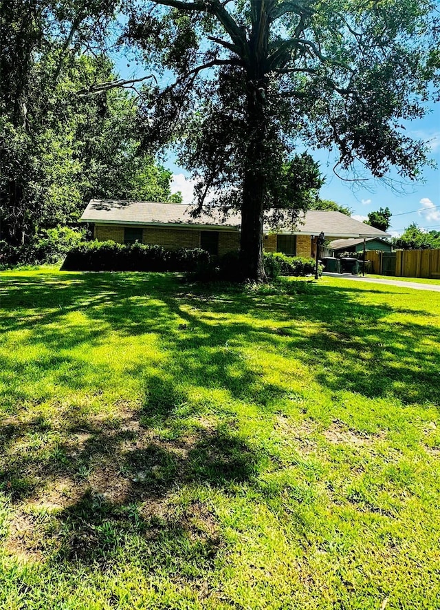 view of yard featuring a carport