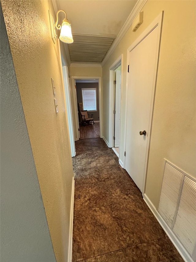 corridor featuring ornamental molding