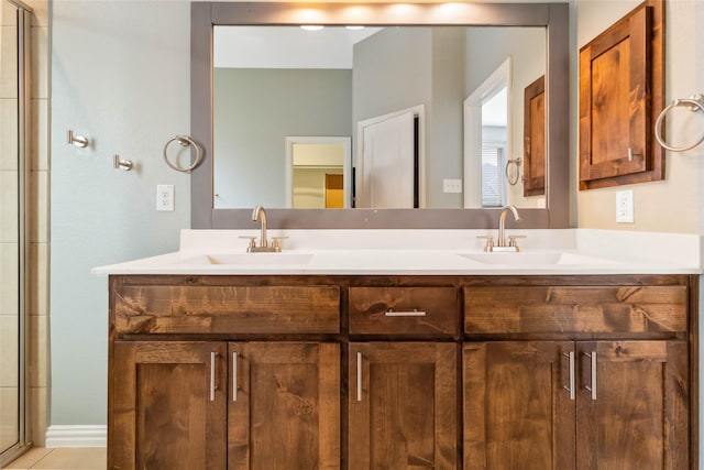 bathroom with vanity and walk in shower