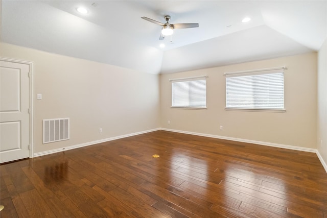 unfurnished room featuring ceiling fan, dark wood-type flooring, and vaulted ceiling