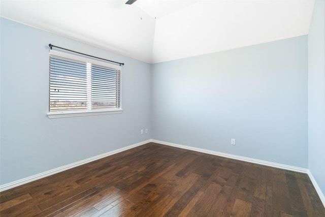 unfurnished room with ceiling fan, lofted ceiling, and dark wood-type flooring