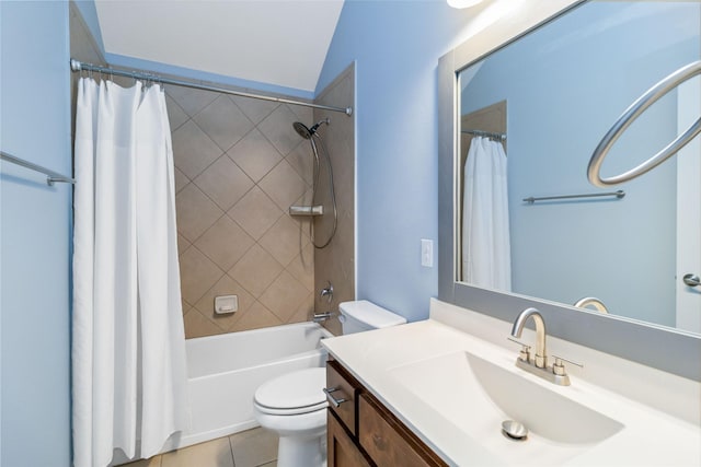 full bathroom featuring vanity, vaulted ceiling, shower / bath combo with shower curtain, tile patterned flooring, and toilet