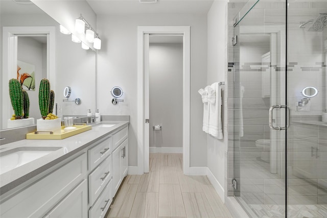 bathroom with vanity and walk in shower