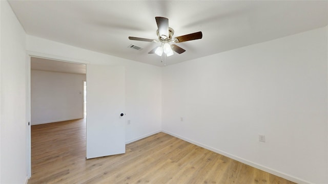 unfurnished room featuring light hardwood / wood-style flooring and ceiling fan