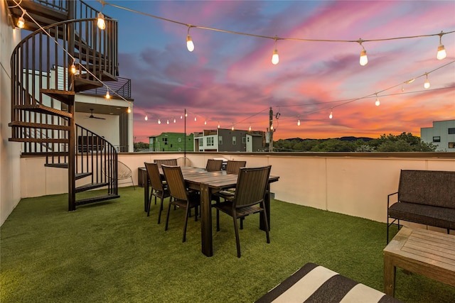 exterior space featuring a balcony and a yard