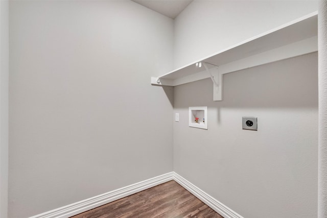 laundry area with hookup for a washing machine, electric dryer hookup, and hardwood / wood-style floors