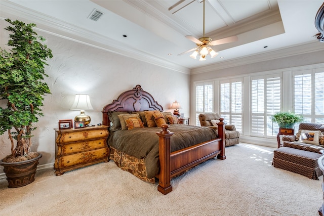 carpeted bedroom with ceiling fan and crown molding