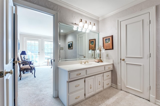 bathroom with vanity and ornamental molding