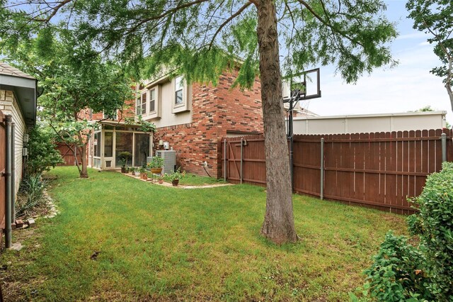 view of yard featuring central AC