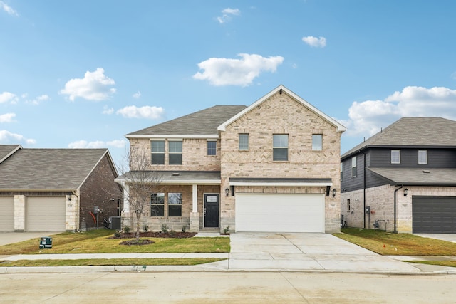 view of front of property featuring cooling unit, a garage, covered porch, and a front lawn