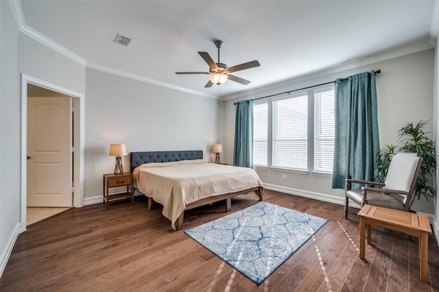 bedroom with dark wood-type flooring, ceiling fan, and crown molding