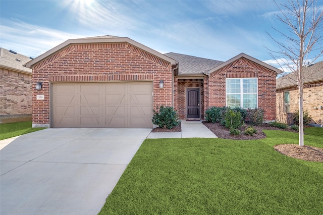 view of front facade featuring a front yard and a garage