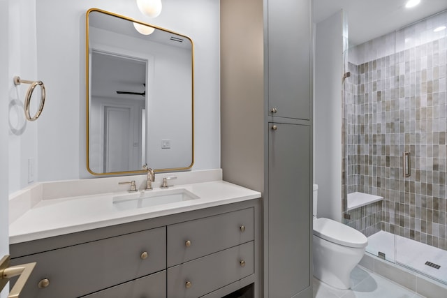 bathroom with vanity, toilet, walk in shower, and ceiling fan