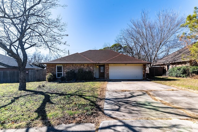 ranch-style home with a garage and a front yard