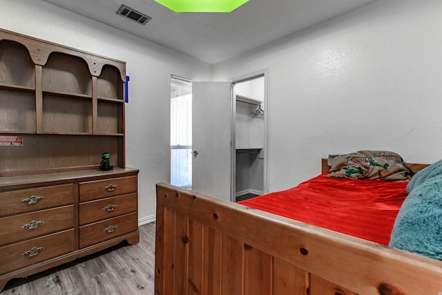 bedroom featuring light hardwood / wood-style floors