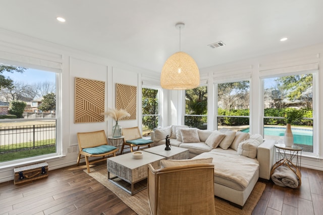 sunroom featuring a wealth of natural light