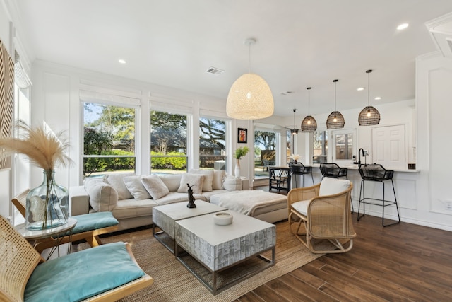 living room featuring dark hardwood / wood-style flooring