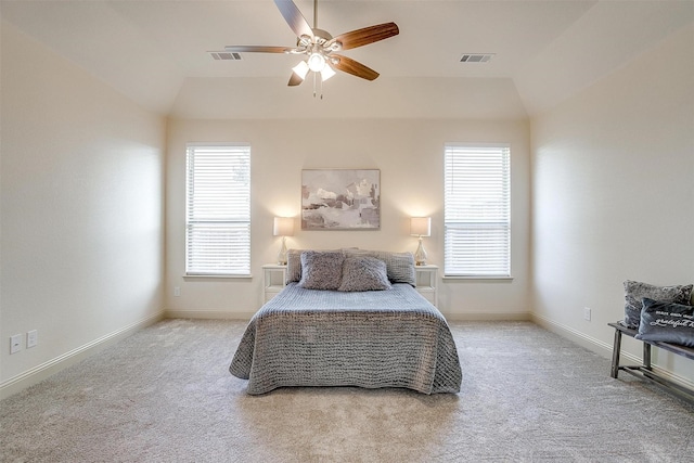 bedroom featuring lofted ceiling, light carpet, and ceiling fan