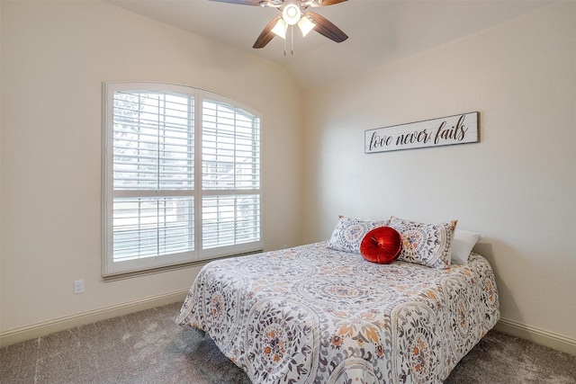 carpeted bedroom featuring ceiling fan and lofted ceiling