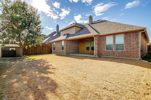 back of property with a patio area