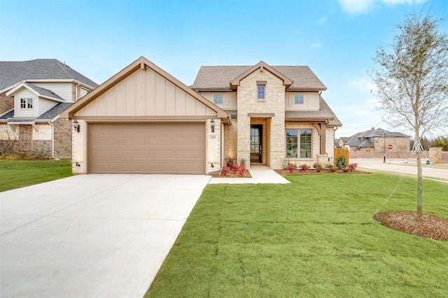 craftsman house with a front lawn and a garage