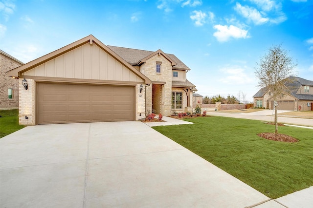 craftsman-style house with a garage and a front yard