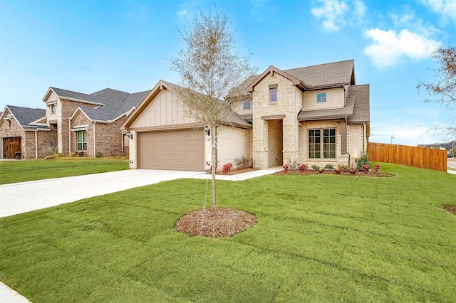 view of front of house featuring a garage and a front yard