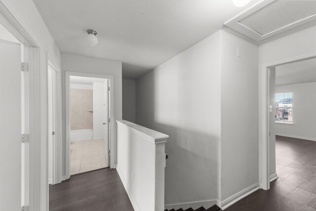 hallway featuring dark hardwood / wood-style floors