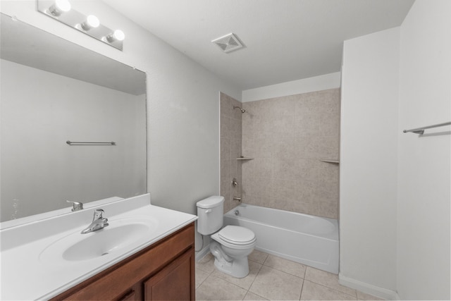 full bathroom with tile patterned flooring, vanity, toilet, and tiled shower / bath