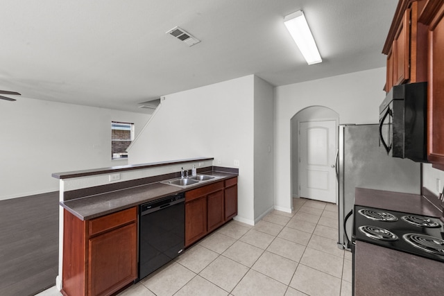 kitchen with ceiling fan, sink, light tile patterned flooring, and black appliances