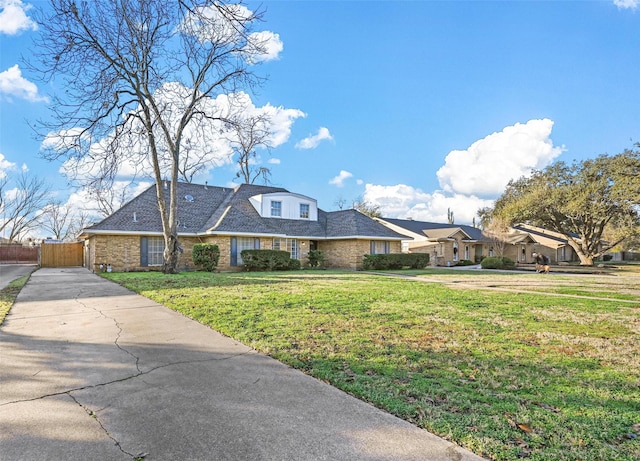 view of front of home with a front lawn