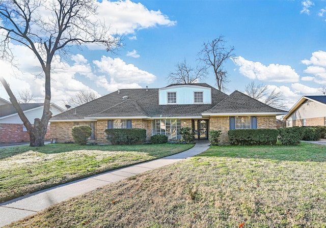 front facade with a front yard