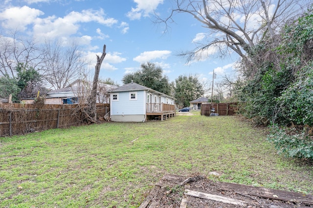 view of yard featuring a deck