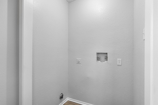 laundry area with hardwood / wood-style floors, electric dryer hookup, and hookup for a washing machine