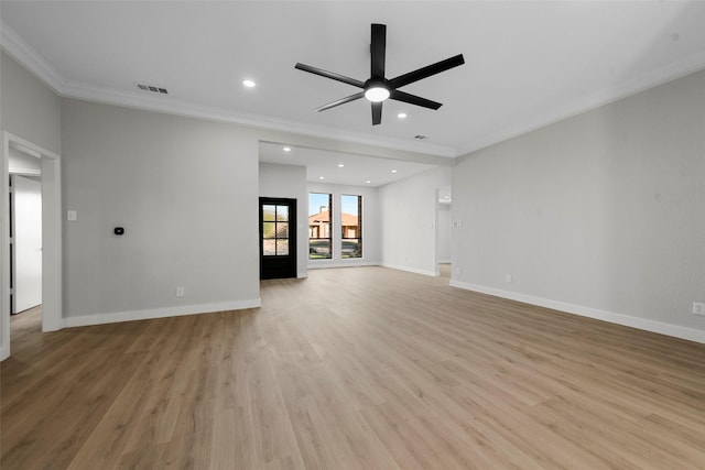 unfurnished living room with ceiling fan, light wood-type flooring, and ornamental molding