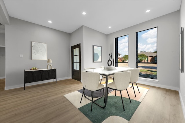 dining space featuring light hardwood / wood-style flooring