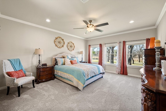 carpeted bedroom with recessed lighting, baseboards, ceiling fan, and ornamental molding