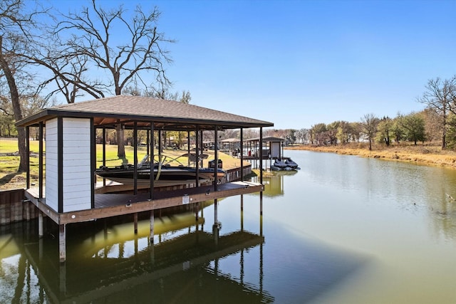 view of dock with a water view and boat lift