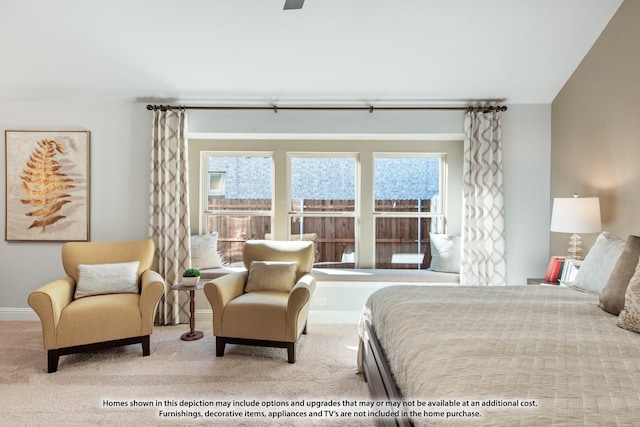 carpeted bedroom featuring multiple windows